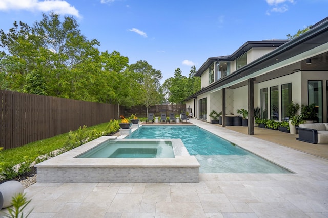 11736 Canyon Ct, Conroe, TX 77385 - view of swimming pool featuring a fenced backyard, an in-ground hot tub, and a patio