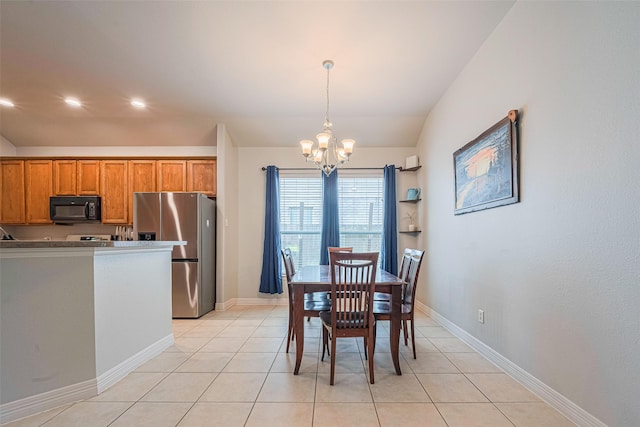 723 Hinsdale, Magnolia, TX 77354 - dining space featuring a chandelier, lofted ceiling, light tile patterned floors, baseboards, and recessed lighting
