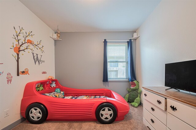 723 Hinsdale, Magnolia, TX 77354 - carpeted bedroom with baseboards