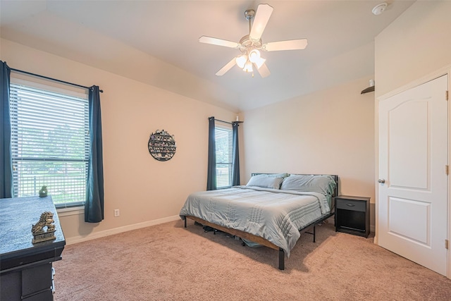 723 Hinsdale, Magnolia, TX 77354 - bedroom with light colored carpet, baseboards, and a ceiling fan