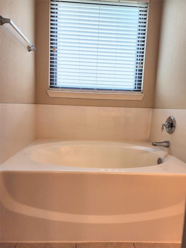 723 Hinsdale, Magnolia, TX 77354 - bathroom featuring a garden tub