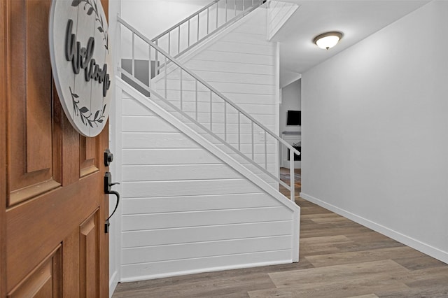 4220 Kenbrook Dr, Nacogdoches, TX 75965 - entrance foyer with baseboards, stairway, and wood finished floors
