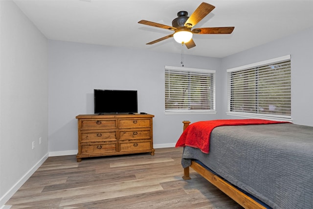 4220 Kenbrook Dr, Nacogdoches, TX 75965 - bedroom featuring baseboards, wood finished floors, and ceiling fan