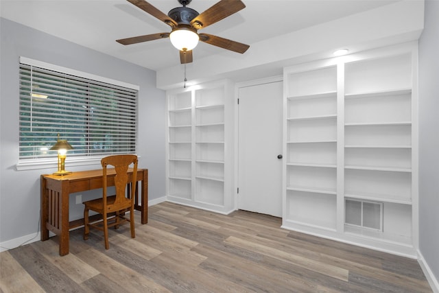 4220 Kenbrook Dr, Nacogdoches, TX 75965 - office with ceiling fan, wood finished floors, and baseboards