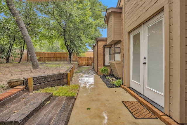 4220 Kenbrook Dr, Nacogdoches, TX 75965 - fenced backyard with a patio