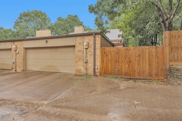 4220 Kenbrook Dr, Nacogdoches, TX 75965 - garage with concrete driveway