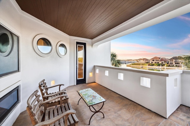 721 Harborside Way, League City, TX 77565 - patio terrace at dusk featuring a balcony