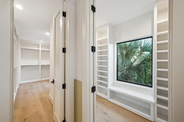 721 Harborside Way, League City, TX 77565 - hall featuring light wood finished floors and recessed lighting