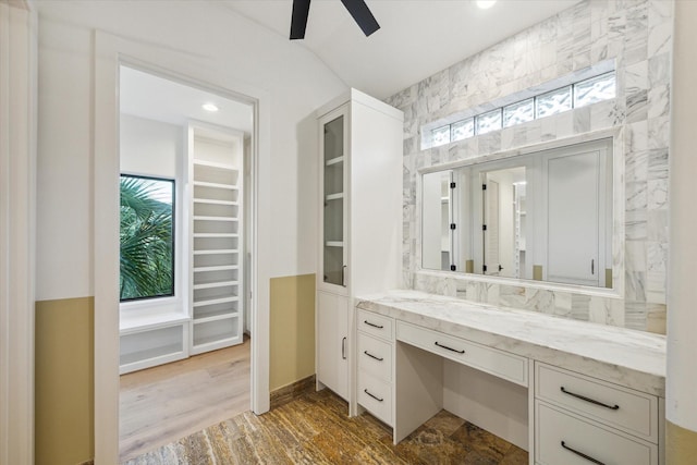 721 Harborside Way, League City, TX 77565 - bathroom with a ceiling fan, vanity, and wood finished floors