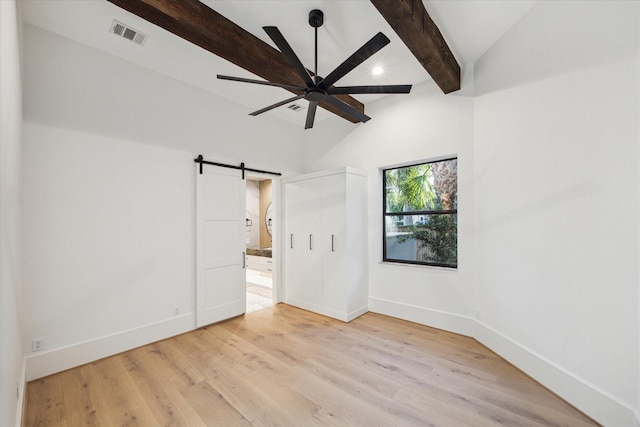 721 Harborside Way, League City, TX 77565 - empty room featuring a barn door, baseboards, a ceiling fan, light wood-type flooring, and recessed lighting