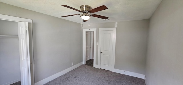 215 San Jacinto St, Highlands, TX 77562 - unfurnished bedroom featuring carpet floors, baseboards, and ceiling fan