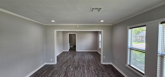 215 San Jacinto St, Highlands, TX 77562 - spare room featuring dark wood-type flooring, baseboards, a textured ceiling, recessed lighting, and crown molding
