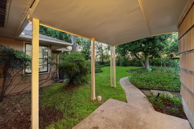 1309 Centennial Dr, Houston, TX 77055 - view of green lawn featuring a patio