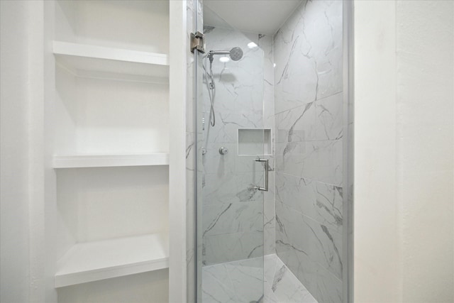 1309 Centennial Dr, Houston, TX 77055 - full bathroom with a marble finish shower