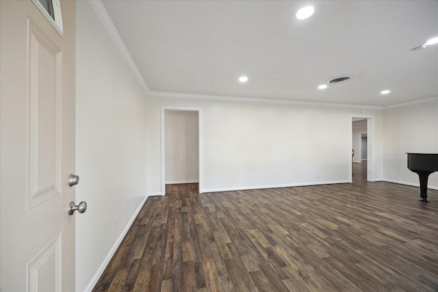 1309 Centennial Dr, Houston, TX 77055 - spare room featuring ornamental molding, recessed lighting, baseboards, and dark wood-type flooring