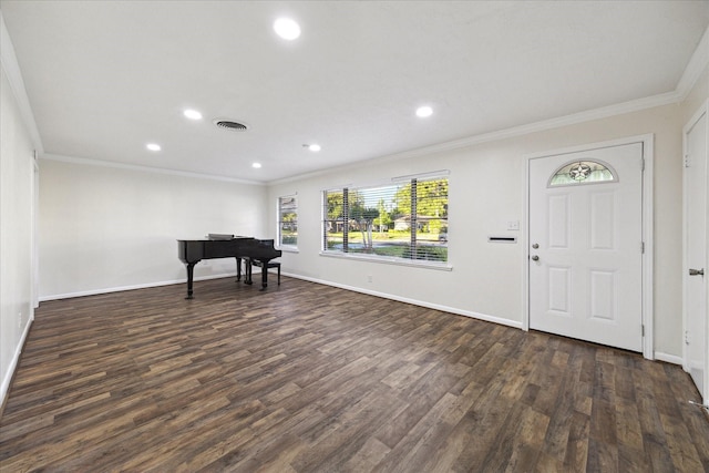 1309 Centennial Dr, Houston, TX 77055 - entryway featuring crown molding, dark wood-type flooring, recessed lighting, and baseboards
