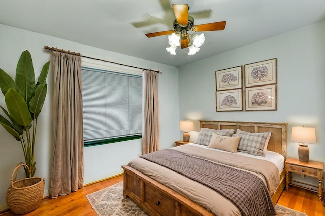 10134 Brinwood Dr, Houston, TX 77043 - bedroom featuring light wood-style floors and a ceiling fan