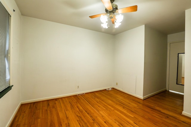 10134 Brinwood Dr, Houston, TX 77043 - spare room with wood finished floors, ceiling fan, and baseboards