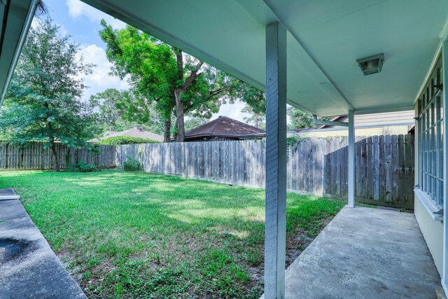 10134 Brinwood Dr, Houston, TX 77043 - view of yard with a patio area