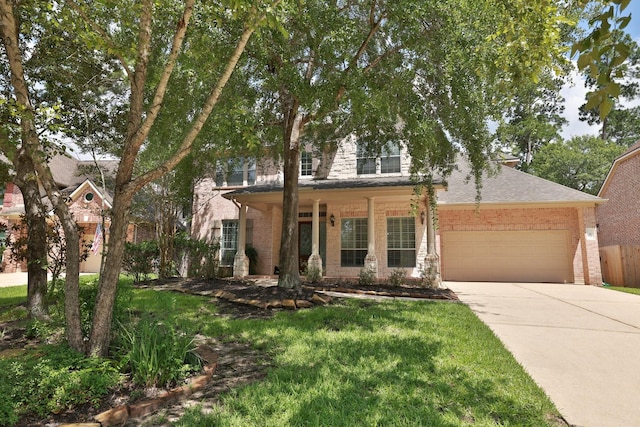 6 Lovenote Ct, The Woodlands, TX 77382 - view of front of house with brick siding, concrete driveway, an attached garage, and a shingled roof
