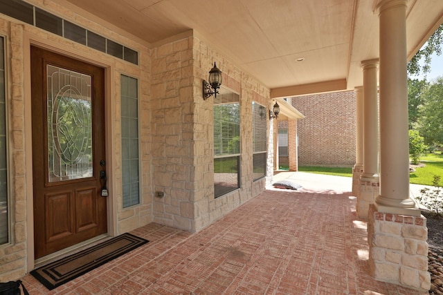 6 Lovenote Ct, The Woodlands, TX 77382 - doorway to property with a porch