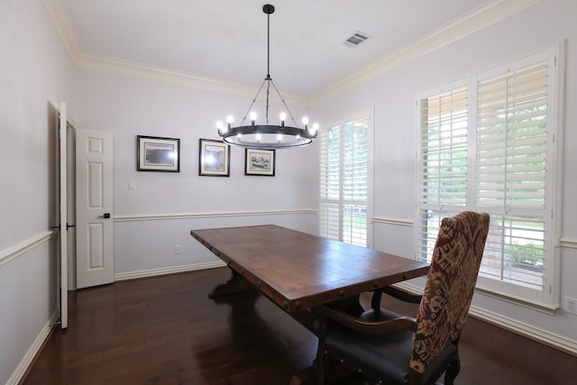 6 Lovenote Ct, The Woodlands, TX 77382 - dining room featuring a chandelier, crown molding, wood finished floors, and baseboards