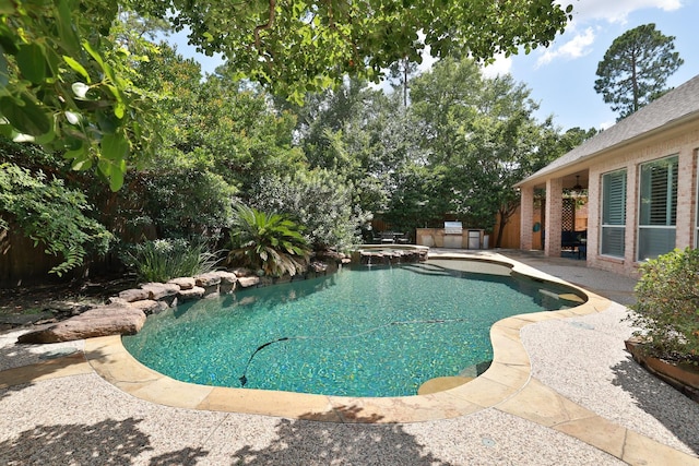 6 Lovenote Ct, The Woodlands, TX 77382 - outdoor pool featuring an in-ground hot tub and a patio area
