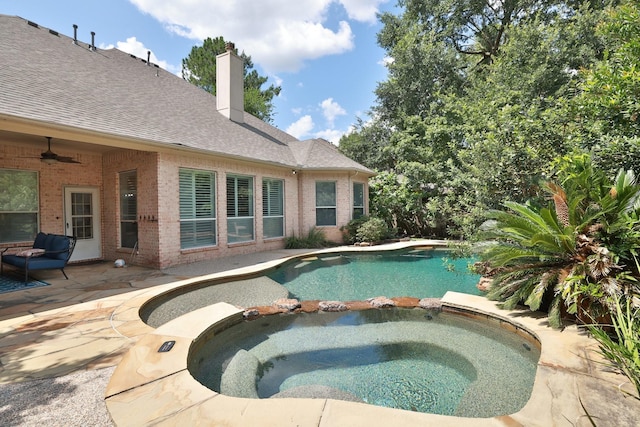 6 Lovenote Ct, The Woodlands, TX 77382 - view of pool with a pool with connected hot tub, a patio area, and a ceiling fan