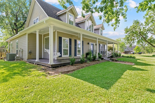 5318 E Plantation Oaks Dr, Arcola, TX 77583 - view of side of home featuring a porch, central AC, and a yard