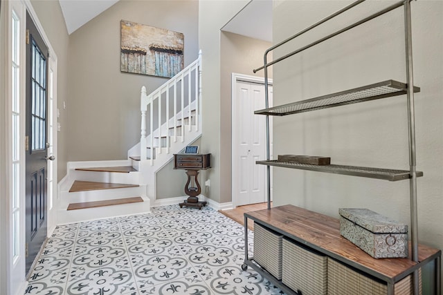 5318 E Plantation Oaks Dr, Arcola, TX 77583 - entryway featuring stairs, baseboards, and lofted ceiling