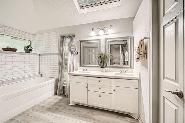 3106 Village Springs Ct, Houston, TX 77339 - full bathroom with a textured wall, double vanity,  shower combination, a skylight, and wood finished floors