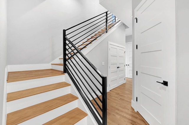 1505 Stuart St, Houston, TX 77004 - staircase featuring wood finished floors