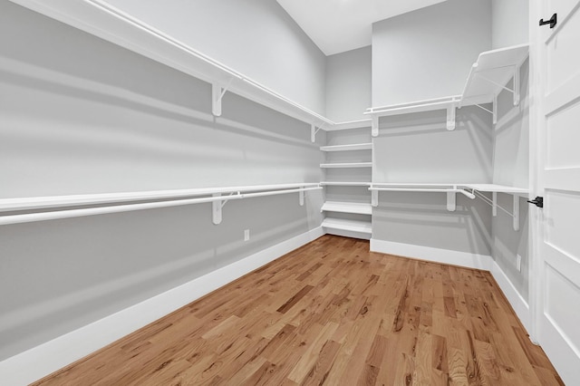 1505 Stuart St, Houston, TX 77004 - walk in closet featuring light wood-type flooring