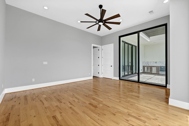 1505 Stuart St, Houston, TX 77004 - empty room with light wood-style floors, baseboards, ceiling fan, and recessed lighting