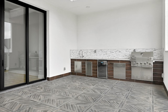1505 Stuart St, Houston, TX 77004 - view of patio with beverage cooler, a sink, and grilling area