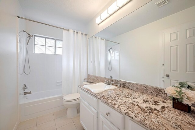 2130 Avenida La Quinta St, Houston, TX 77077 - bathroom with vanity, shower / bath combo with shower curtain, toilet, and tile patterned floors