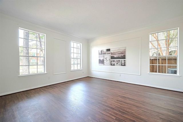 2130 Avenida La Quinta St, Houston, TX 77077 - spare room featuring dark wood finished floors, crown molding, and baseboards
