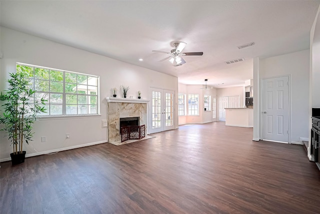 2130 Avenida La Quinta St, Houston, TX 77077 - unfurnished living room with plenty of natural light, ceiling fan, dark wood-type flooring, and baseboards