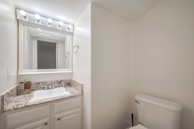 2130 Avenida La Quinta St, Houston, TX 77077 - bathroom with vanity and toilet