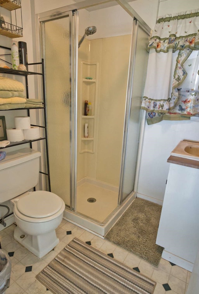 5216 County Road 469 Unit 10, Brazoria, TX 77422 - full bathroom featuring toilet, tile patterned flooring, and a shower stall