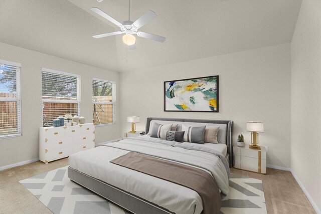 11410 Dahlia Dale Dr, Tomball, TX 77375 - bedroom with light colored carpet, baseboards, and a ceiling fan