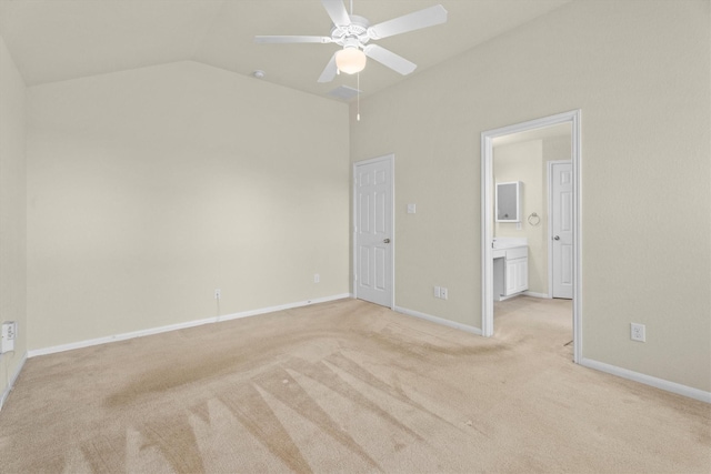 11410 Dahlia Dale Dr, Tomball, TX 77375 - unfurnished bedroom featuring light colored carpet, ceiling fan, connected bathroom, baseboards, and high vaulted ceiling