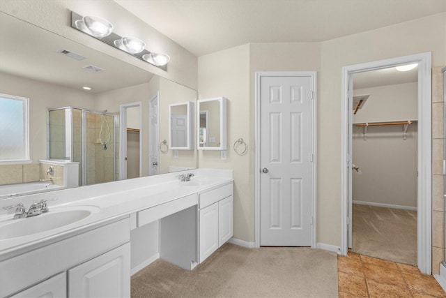 11410 Dahlia Dale Dr, Tomball, TX 77375 - full bathroom with double vanity, a stall shower, a walk in closet, a garden tub, and baseboards