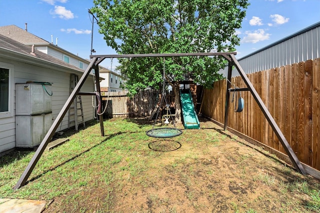 11410 Dahlia Dale Dr, Tomball, TX 77375 - fenced backyard with a playground