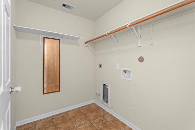 11410 Dahlia Dale Dr, Tomball, TX 77375 - laundry room with electric dryer hookup, washer hookup, baseboards, and hookup for a gas dryer
