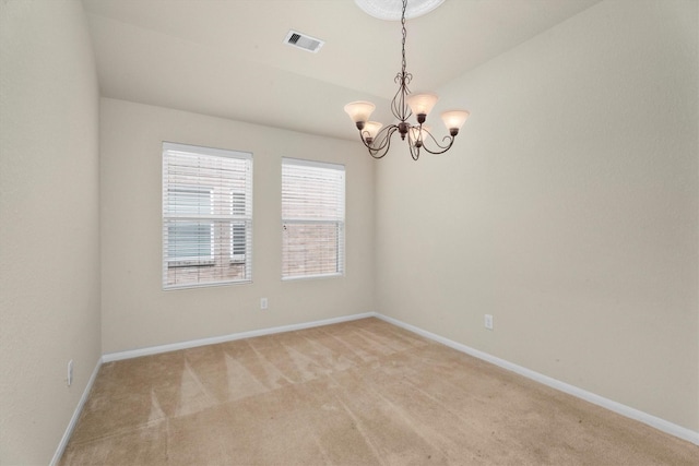 11410 Dahlia Dale Dr, Tomball, TX 77375 - spare room featuring a chandelier, light colored carpet, and baseboards