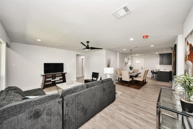 3630 Alsace St, Houston, TX 77021 - living room with recessed lighting, ceiling fan, light wood-style flooring, and baseboards