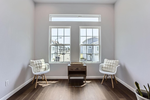 18823 Luminescent Ln, Spring, TX 77379 - living area featuring wood finished floors, healthy amount of natural light, and baseboards