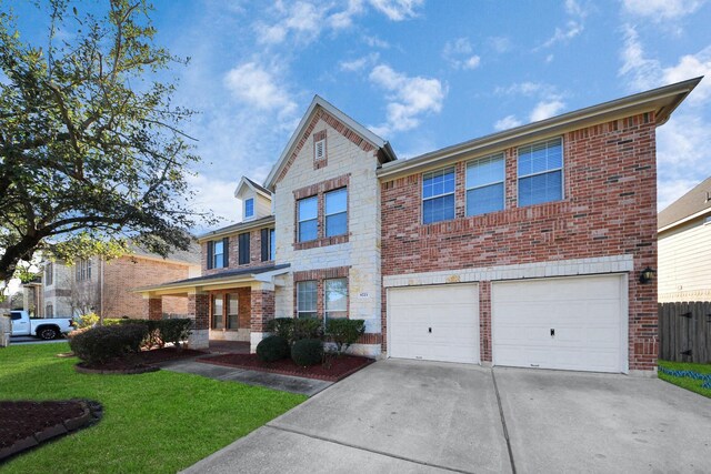 6723 Stableton Ln, Houston, TX 77049 - traditional-style home featuring driveway, brick siding, a garage, and a front yard