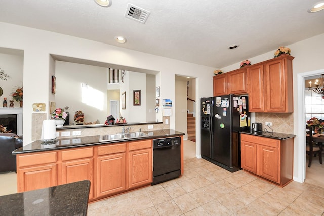 6723 Stableton Ln, Houston, TX 77049 - kitchen featuring black appliances, a sink, backsplash, recessed lighting, and light tile patterned flooring